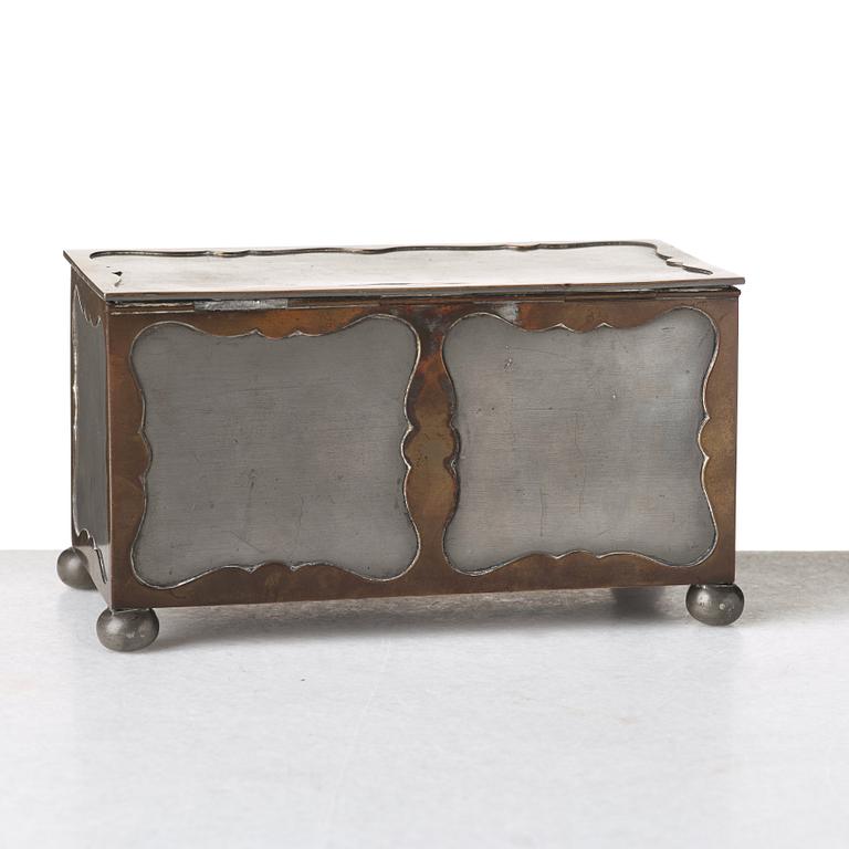 Firma Svenskt Tenn, a pewter and brass box, Stockholm 1930, model A 854.