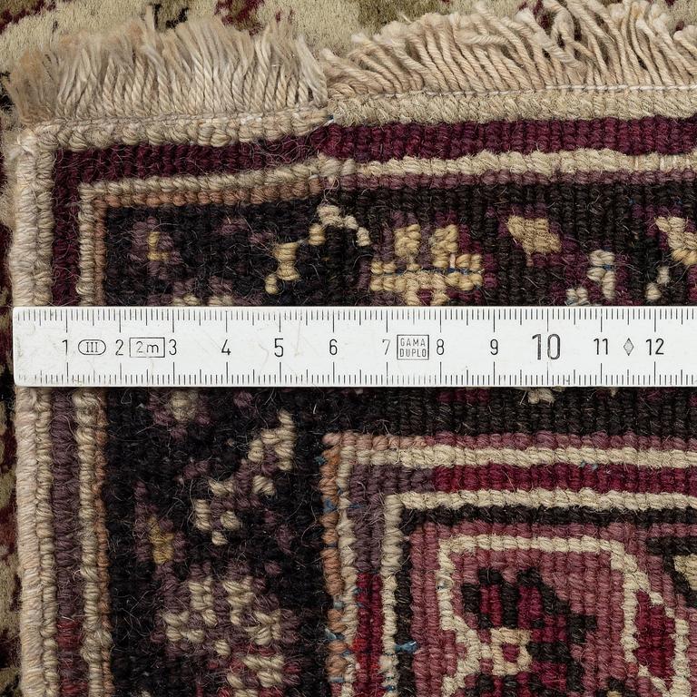 An antique Agra carpet, north India c. 430 x 392 cm.