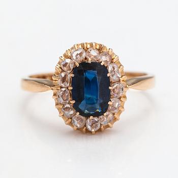 An 18K gold ring with a sapphire and rose-cut diamonds. Esko Raitanen, Helsinki.