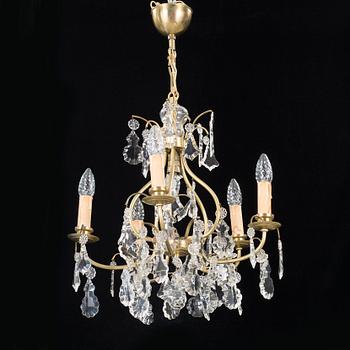 A mid 20th century ceiling lamp in rococo style.