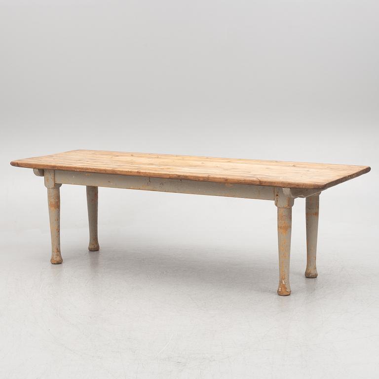 A dining table, late 19th Century.