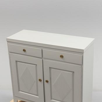 a gustavian style cupboard from around 1900.