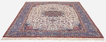 A semi-antique Isfahan carpet, Central Persia, signed (Ali) Seirafian, 328 x 250 cm.