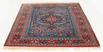 An antique Isfahan, ca 220 x 145 cm.