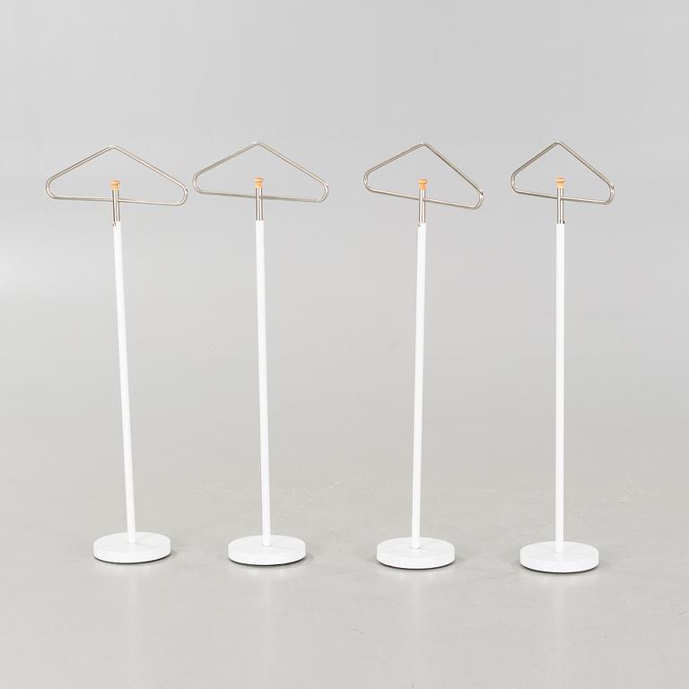 Four coat-hangers from the second half of the 20th century.