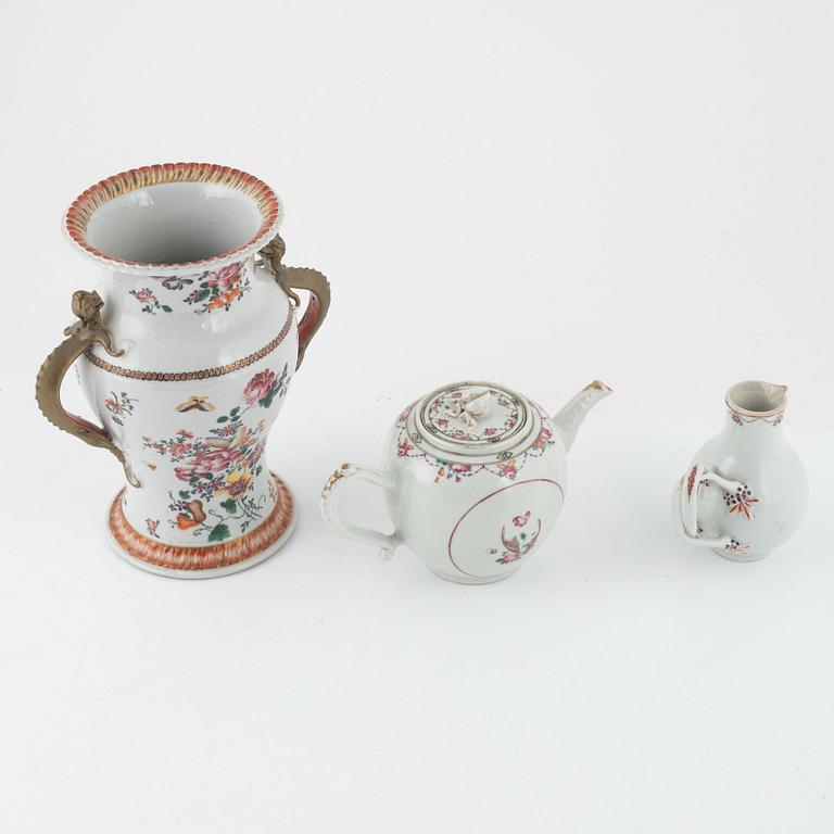 A Chinese export famille rose urn, teapot and jug, Qing dynasty, 18th century.