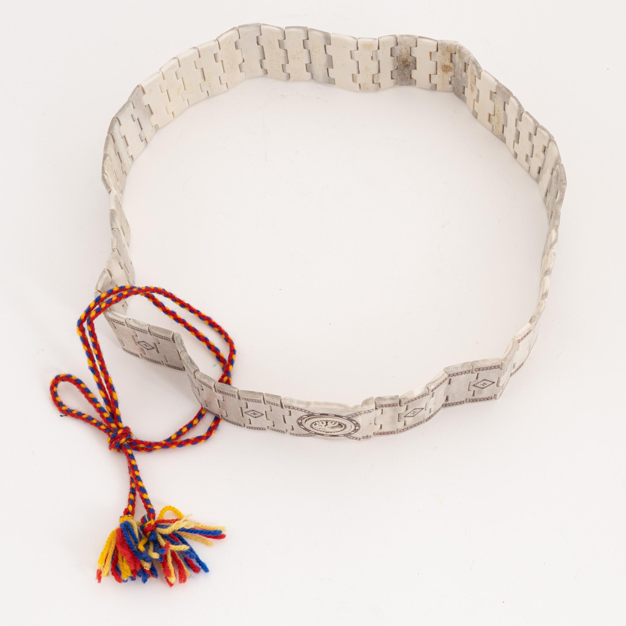 A reindeer horn belt by Gunnar Svonni, signed and dated 1999.