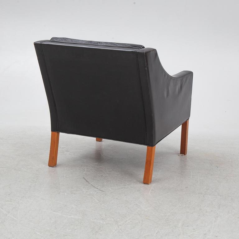 Børge Mogensen, a model 2207 armchair with ottoman, Fredericia Stolefabrik, Denmark, second half of the 20th century.