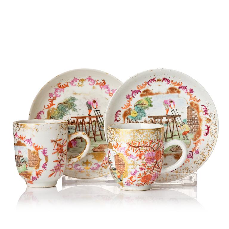 A pair of famille rose cups with saucers, Qing dynasty, Qianlong (1736-95).