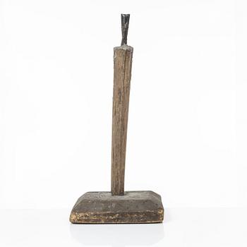 A candle stick, 19th/20th Century.