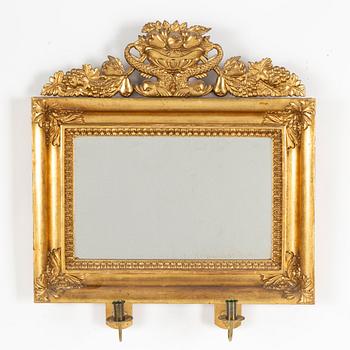 A mid 19th century mirror sconce.