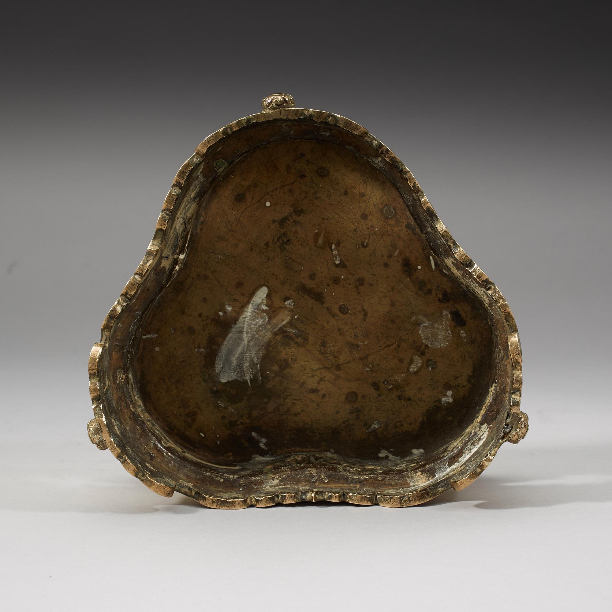 A polished copper alloy stand, Qing dynasty, 18/19th Century.