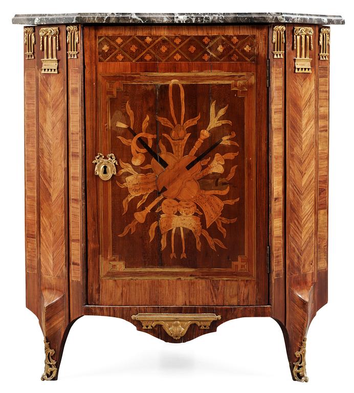 A late 18th Century Louis XVI encoignure stamped by Martin Ohneberg.