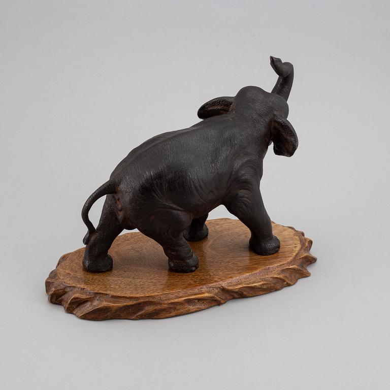 A Japanese bronze sculpture of an elephant, 20th Century. Signed.