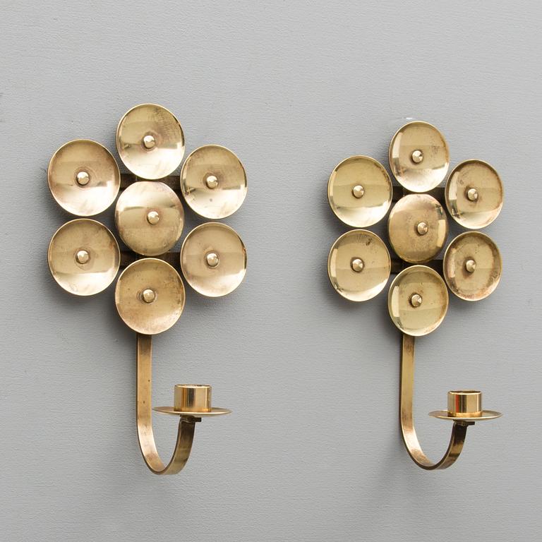 A Pair of Mid Century Swedish Brass Candle Holders by Mora KEE.