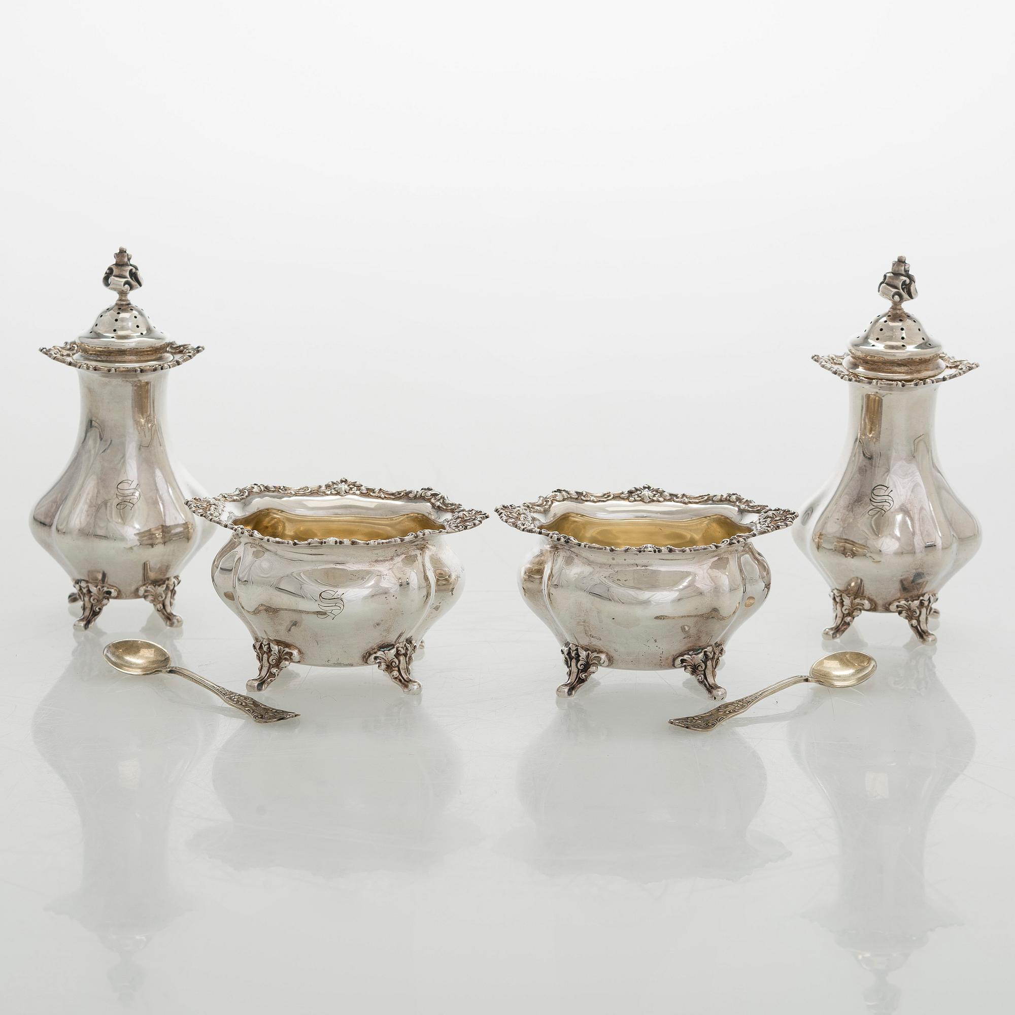 Black Starr & Frost, a pair of sterling silver shakers and sugar bowls, USA around 1900, Gorham pair of sterling spoons.