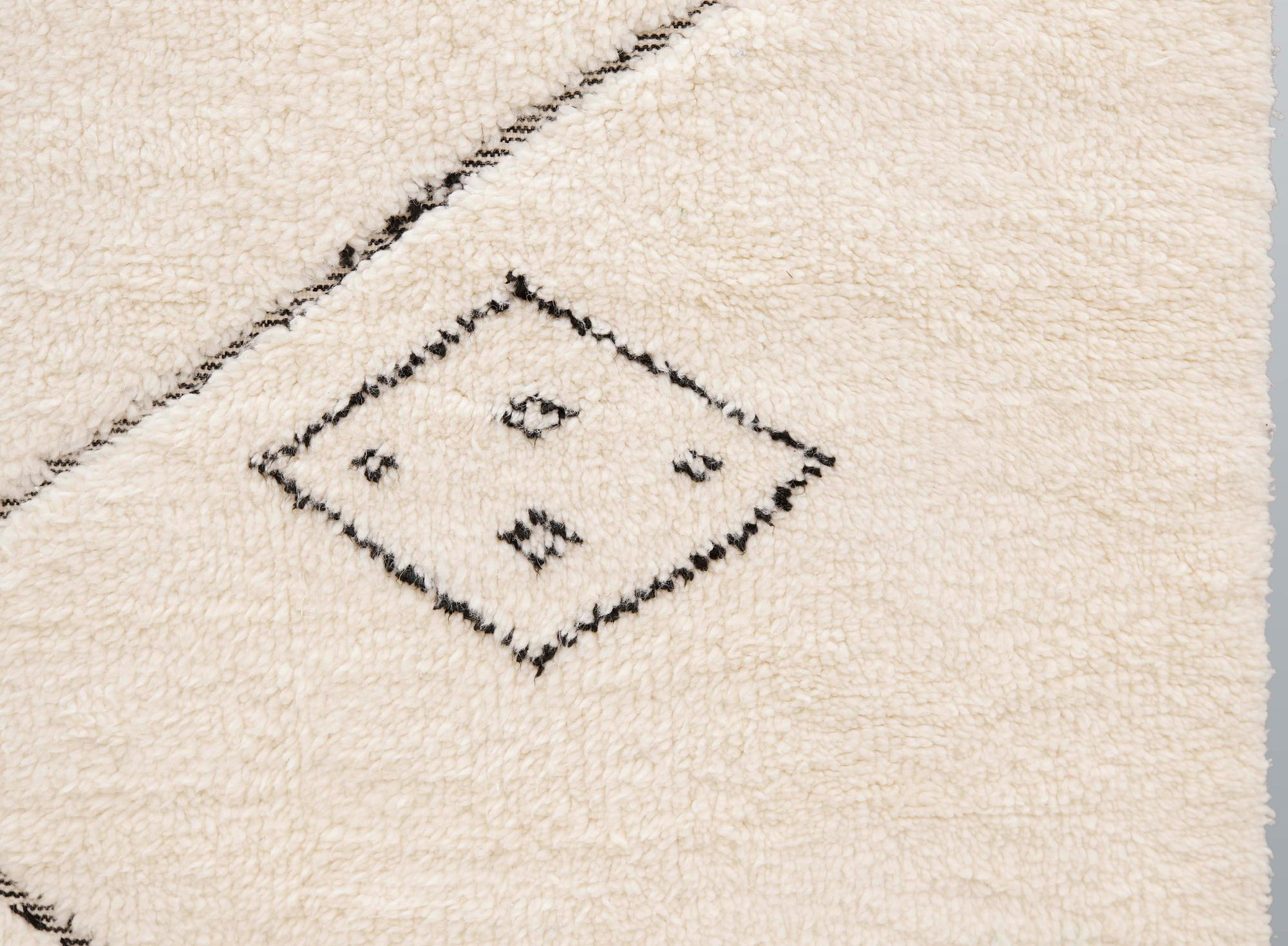 A moroccan carpet, ca 300 x 200 cm.