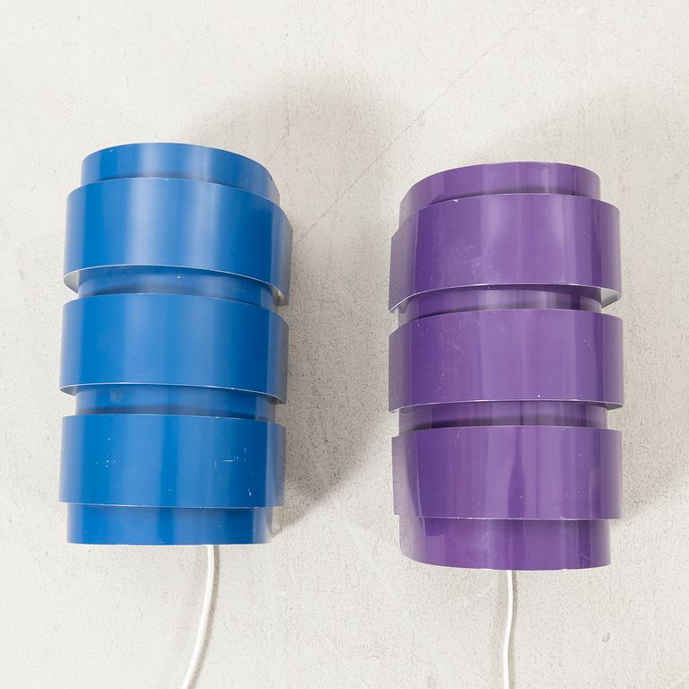 A set of two lacquered metal wall lamps by Hans-Agne Jakobsson from the second half of the 20th century.