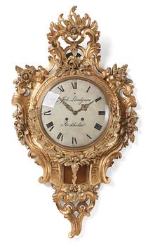 A rococo giltwood cartel clock by J. Lindgren (master in Stockholm 1761-62).