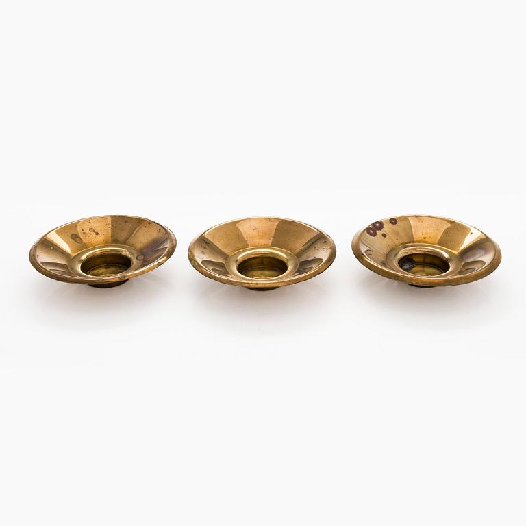 Maija Heikinheimo, a set of three mid-20th century brass underlay for tealight, Valaistustyö for Artek.