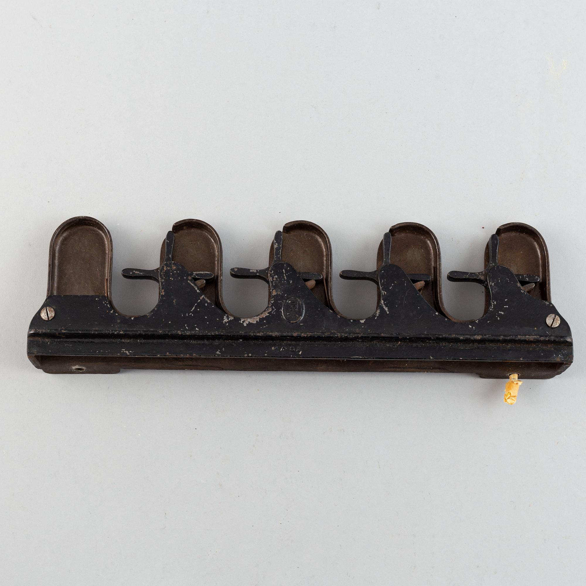 A 19th century iron umbrella and walkingstick holder.