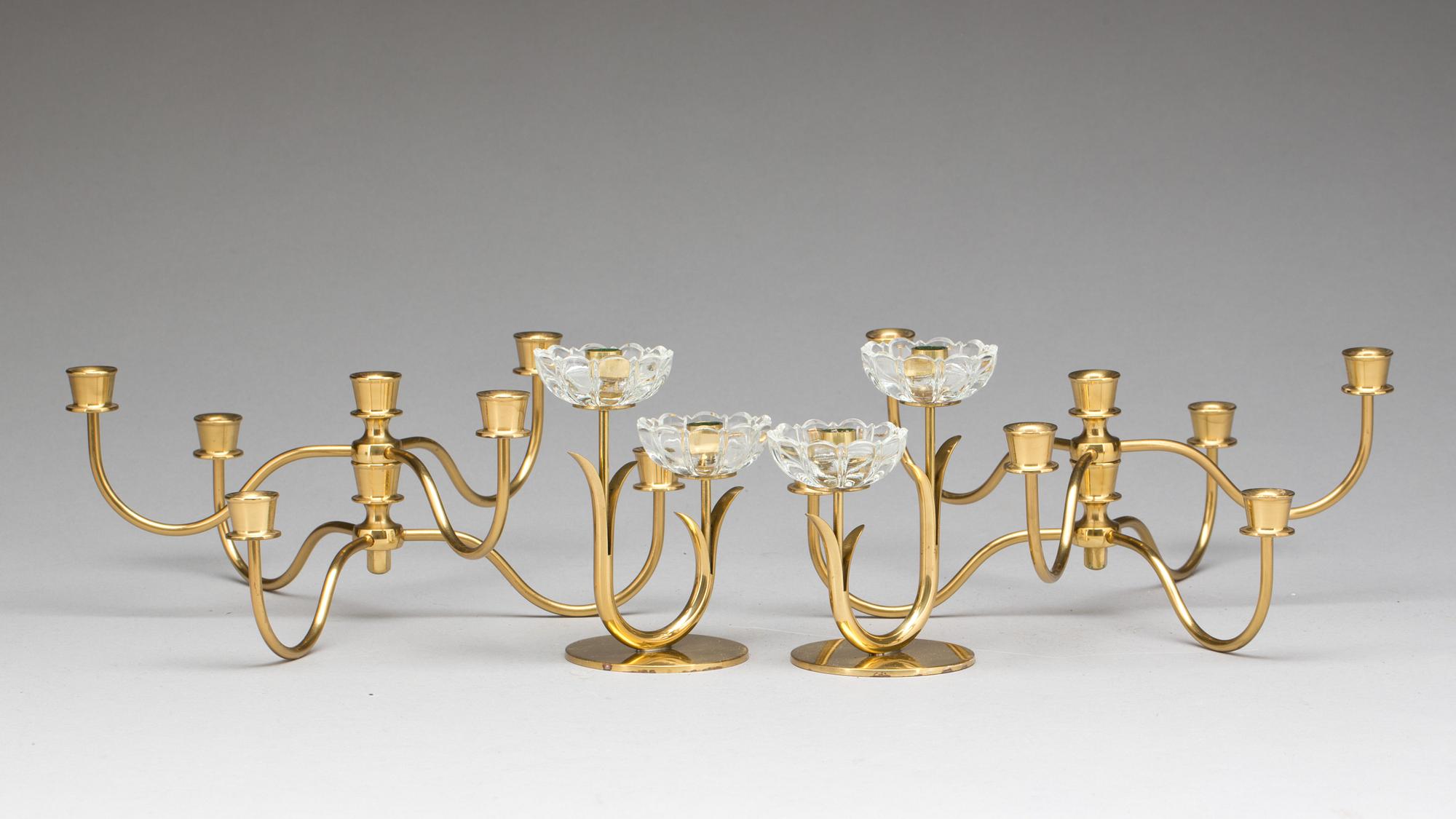 PARTI LJUSSTAKAR och KANDELABRAR, bl a Ystad metall, 2 par.