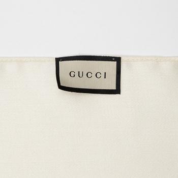 Gucci, a wool and silk mix "GG" jaquard shawl.