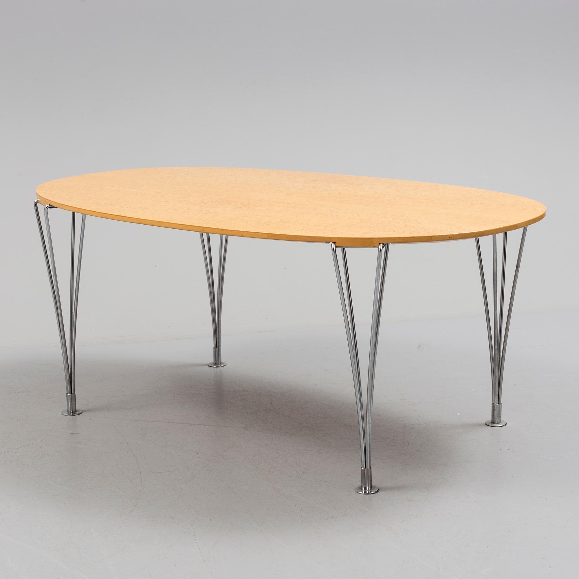 A "Superelips" table by Bruno Mathsson and Piet Hein, 20th century.