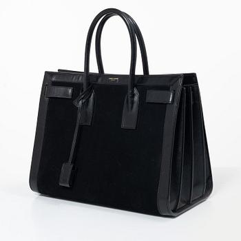 Yves Saint Laurent, a 'Sac du Jour' handbag.