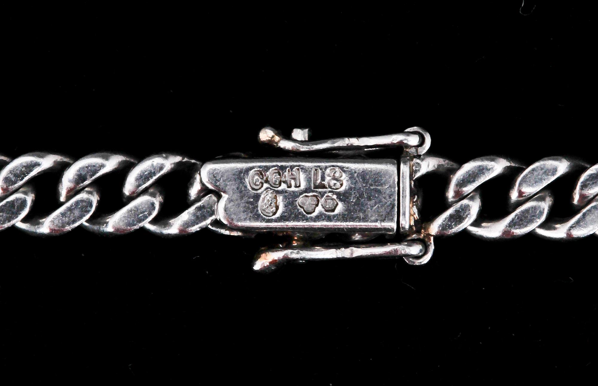 ARMBAND, platina med små diamanter, CG Hallberg, 1937. Ca 15 g.