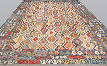 A Kelim carpet, c. 492 x 303 cm.