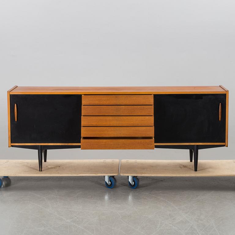 A teak sideboard with black details, by Troeds Sweden, 1960's.