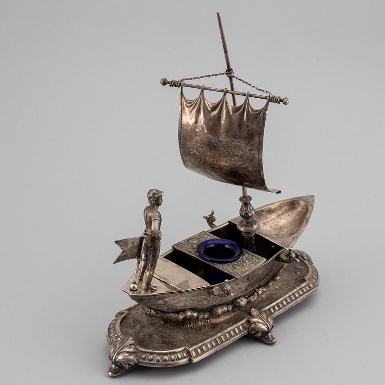 A silver plated inkwell, circa 1900.