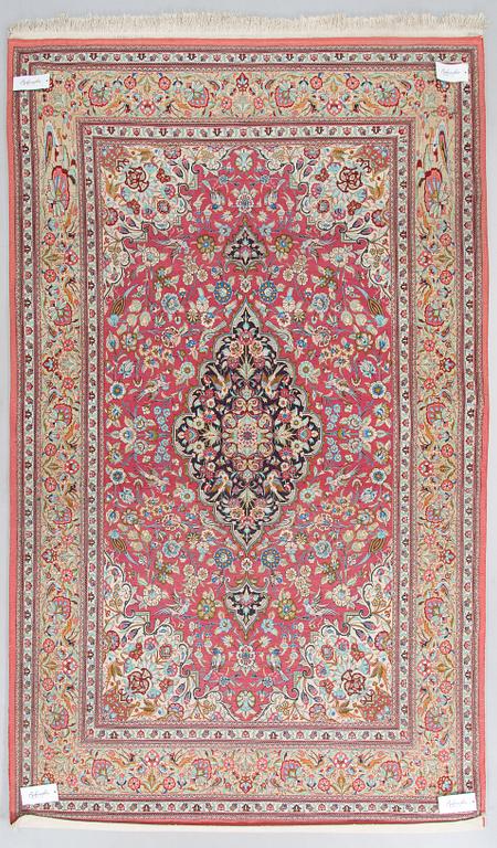 A silk Qum rug, central Persia, approx. 232 x 137 cm.