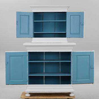 A two-part cabinet, 18th/19th century.