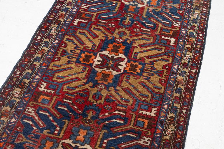 A runner carpet, North Western Iran, c. 317 x 107 cm.