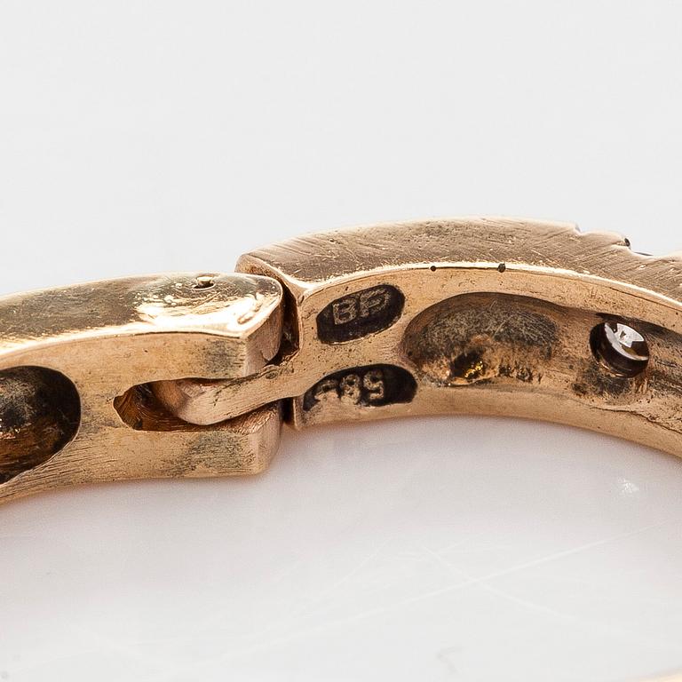 Korvakorut, briljanttihiotut timantit, 14K kultaa.