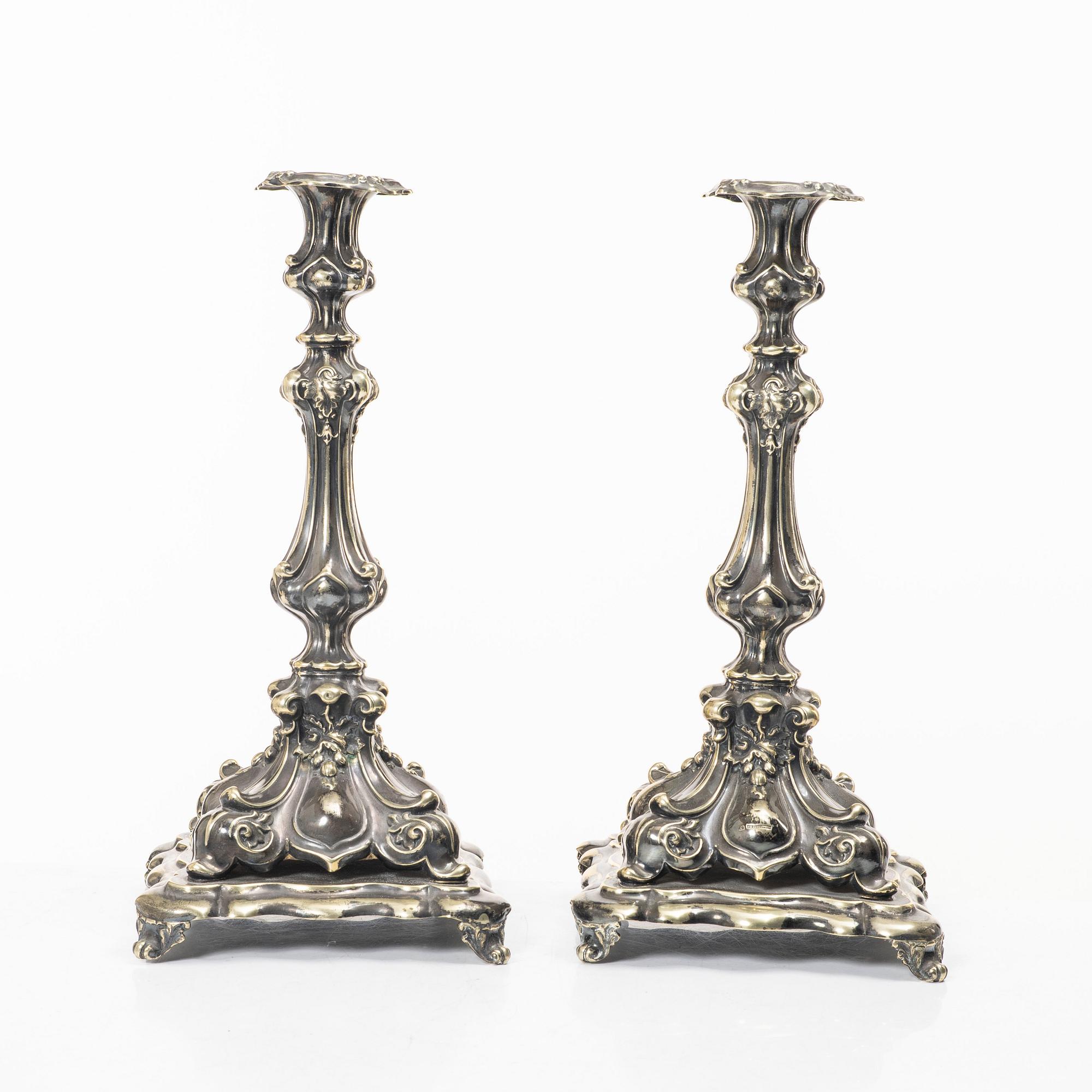 A pair of silver plated Rococo style candelabra, 20th century.