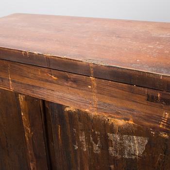 An Art Déco mahogany cabinet.