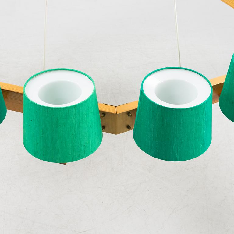 A pine 16-light chandelier, Luxus, Vittsjö.