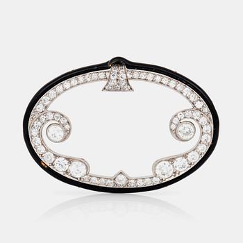 655. BROSCH, Art Deco, signerad Cartier N.Y, med gammalslipade diamanter samt emalj.