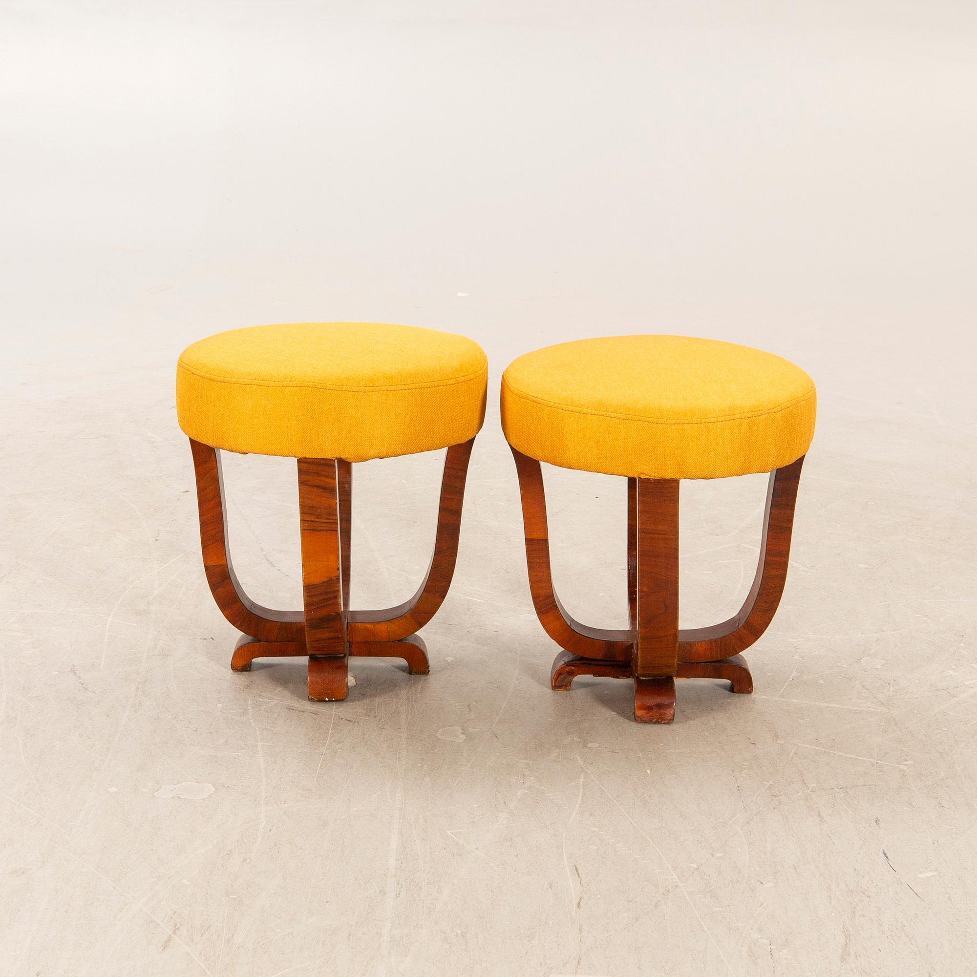 a set of two Art Deco walnut stools first half of the 20th century.