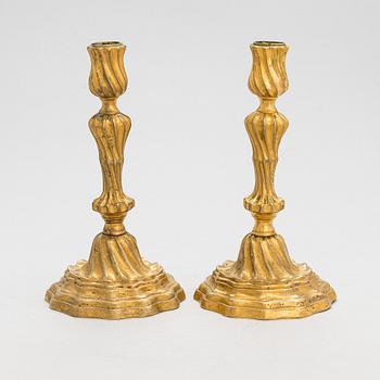A pair of mid-18th century candlesticks France.