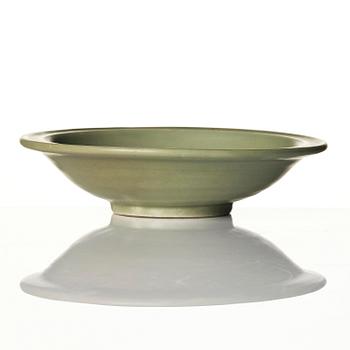 A celadon glazed double fish dish, Ming dynasty (1368-1644).