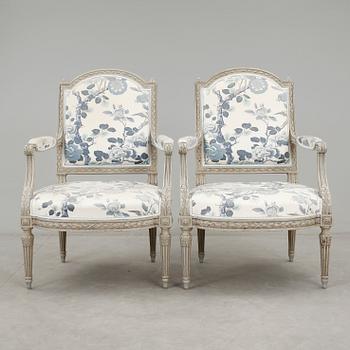 KARMSTOLAR, ett par, Louis XVI-stil, sent 1800-tal.
