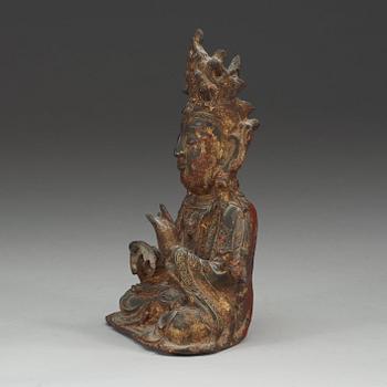 A bronze figure of a sitting Guanyin, Ming dynasty (1368-1644).
