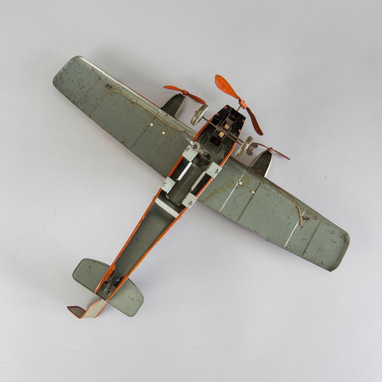A Tipp & Co tinplate airplane, Germany, 1930s.