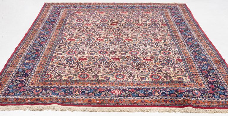 A semi-antique Birjand carpet, Eastern Iran, signed, c 390 x 296 cm.