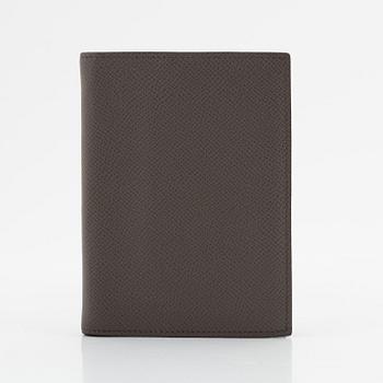 Hermès, notebook with leather case.