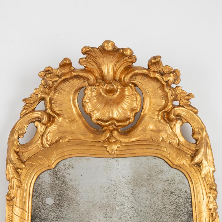 A Rococo mirror, later part of the 18th century.